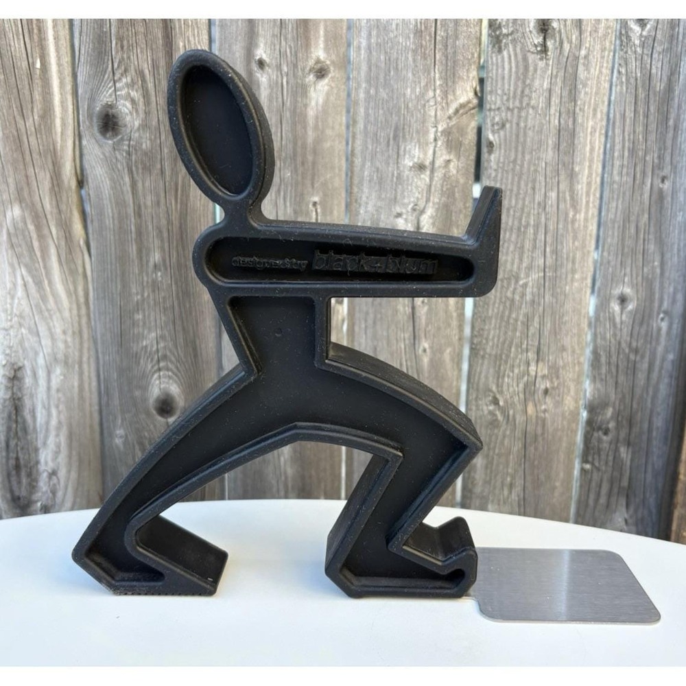 Single James the Bookend rubber figure designed by Black + Blum for library